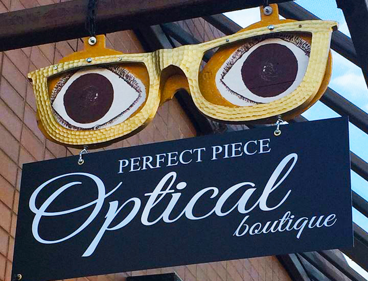 Exterior East-facing sign, over entrance of Perfect Piece Optical Boutique, Mission BC Canada